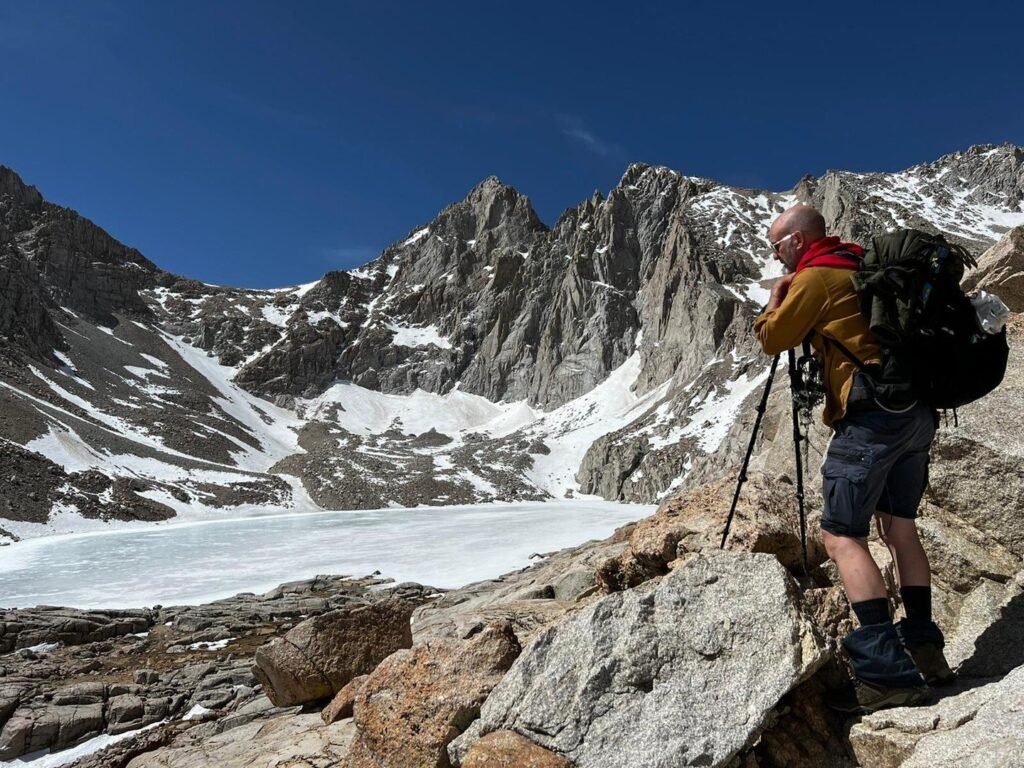 Peter Pendleton looking over a frozen Consultation Lake in the Eastern Sierra