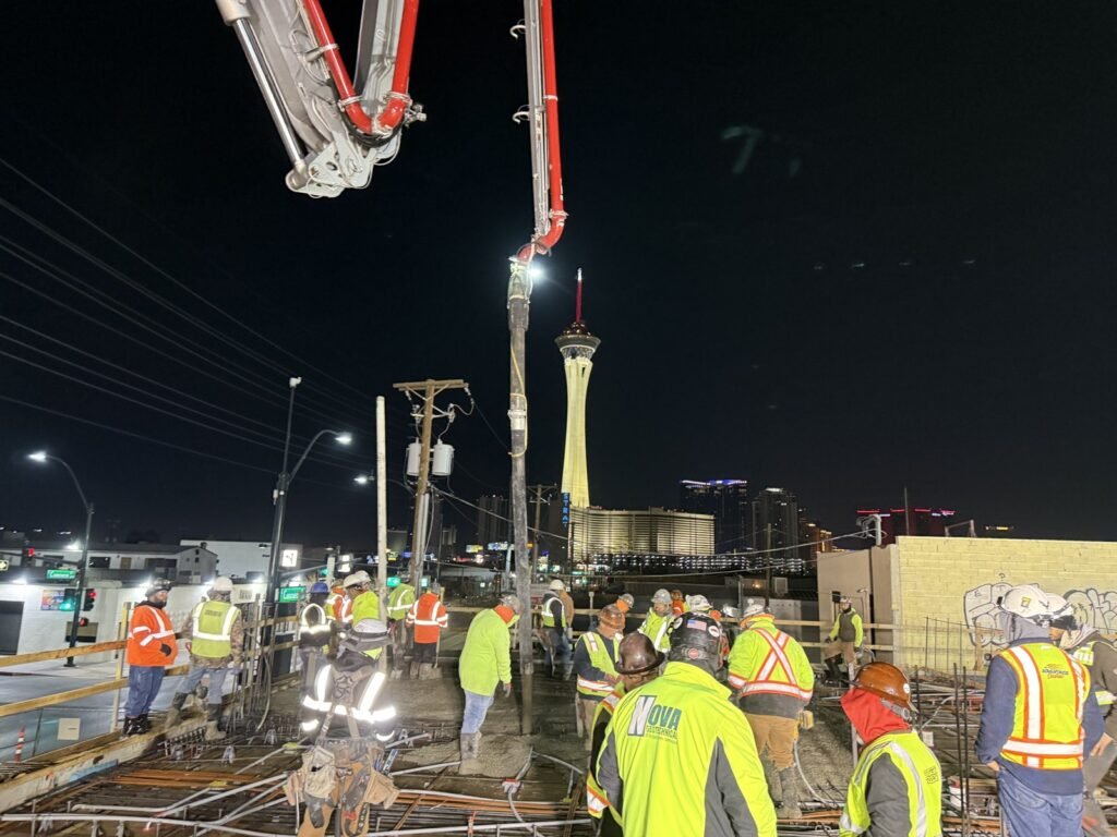 Night concrete pour on a Las Vegas multifamily project with the Strat tower behind